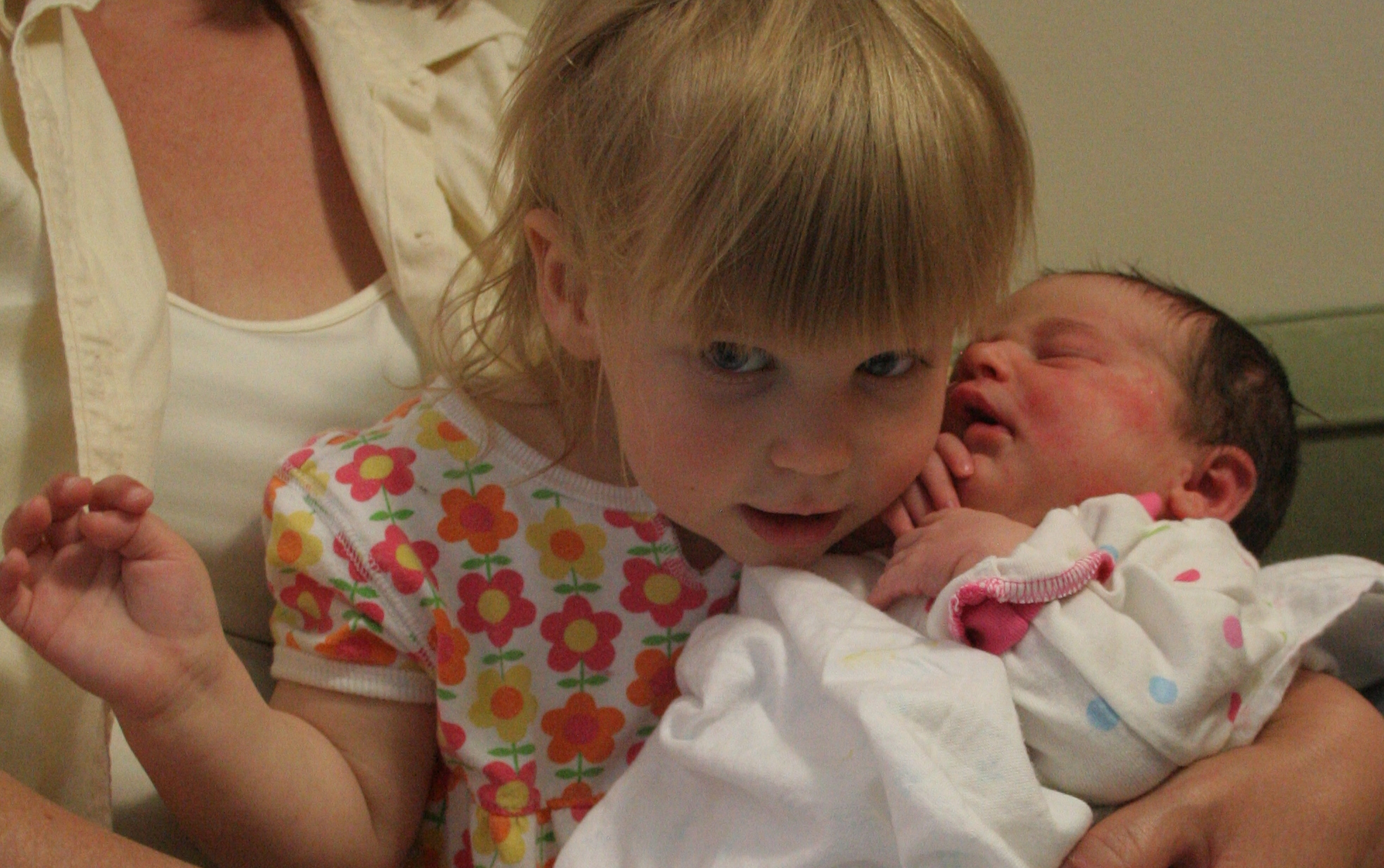 I didn't feel right posting her photo, so here is one of Lillian on the day Katrina was born. There is someone so special about a big sister meeting her new baby.