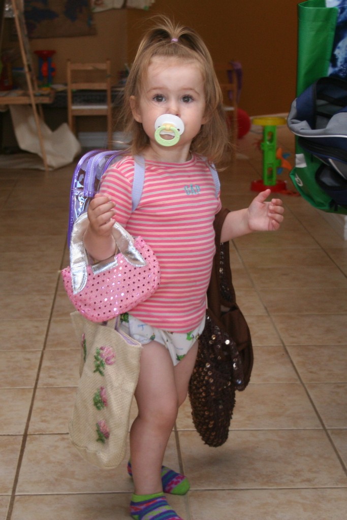 Katrina with her crazy purses. Lillian had one and little miss will NOT be outdone.