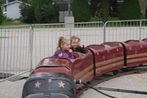 Lilly showing Katrina that the train is great.